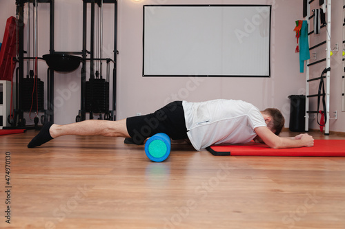 Patient training with roller in modern rehabilitation physiotherapy © Наталья Фомина
