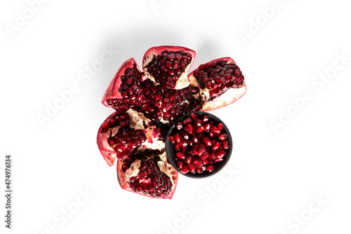 Pomegranate seeds isolated on white background. Pomegranate