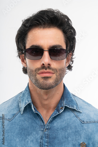 man with glasses, studio shot. © w10