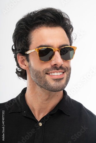 man with glasses, studio shot.