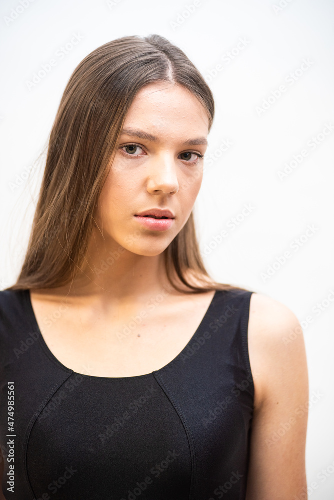 High fashion portrait of young fit elegant woman wearing black clothes. High fashion portrait of young fit elegant woman wearing black clothes.