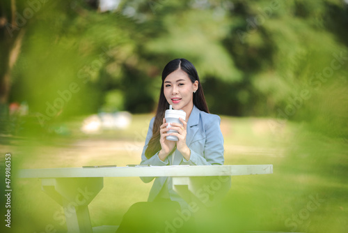 young Asian business woman ...