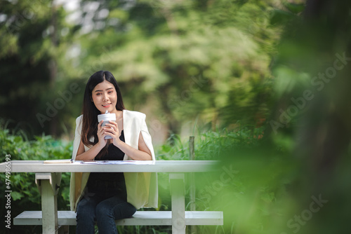 young Asian business woman ...