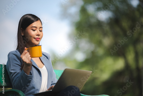 young Asian business woman ...