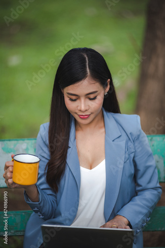 young Asian business woman ...