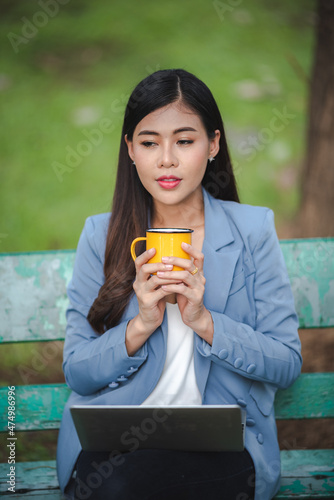 young Asian business woman ...