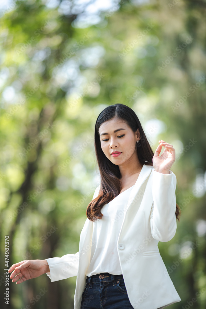 young Asian business woman are smiling and happy lifestyle, outdoor beautiful pretty portrait young Asian business woman are smiling and happy lifestyle, outdoor beautiful pretty portrait