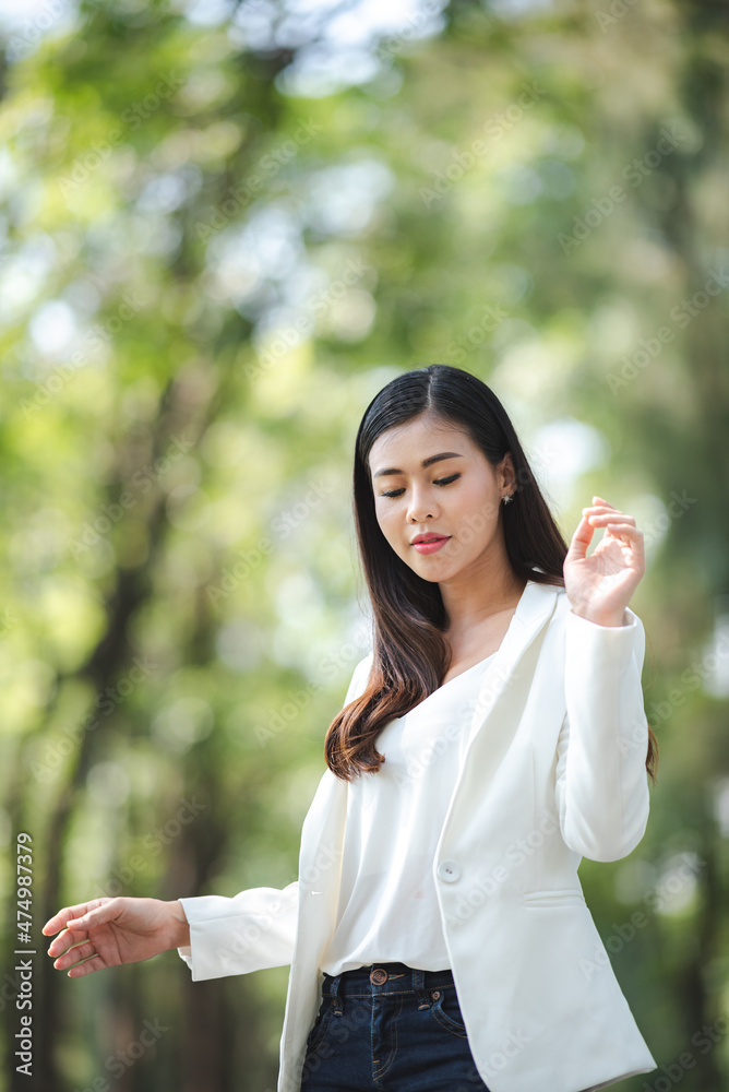 young Asian business woman are smiling and happy lifestyle, outdoor beautiful pretty portrait