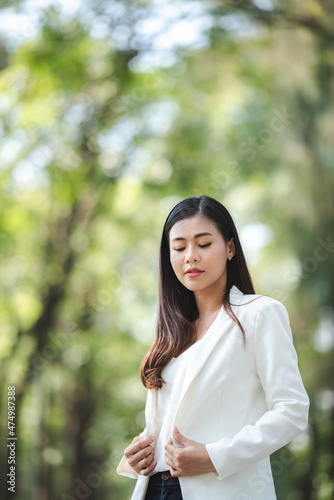 young Asian business woman ...