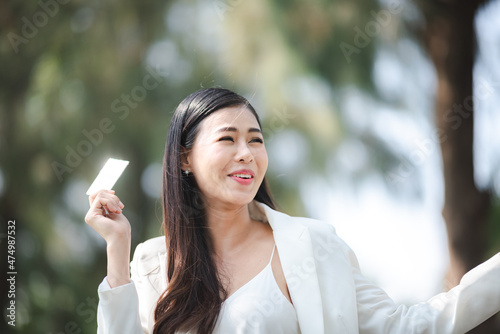 Young Asian business woman person in concept of credit card using for buying and financial