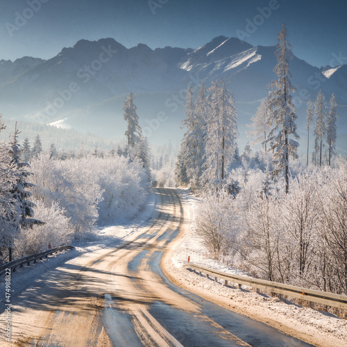 Fototapeta Naklejka Na Ścianę i Meble -  A beautiful winter morning with a view of the High Tatras. Rime and snow created an amazing atmosphere.