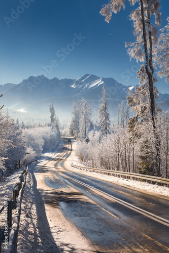 Fototapeta Naklejka Na Ścianę i Meble -  A beautiful winter morning with a view of the High Tatras. Rime and snow created an amazing atmosphere.
