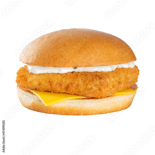 Fish burger with white sauce and cheddar cheese. Isolated on white background.