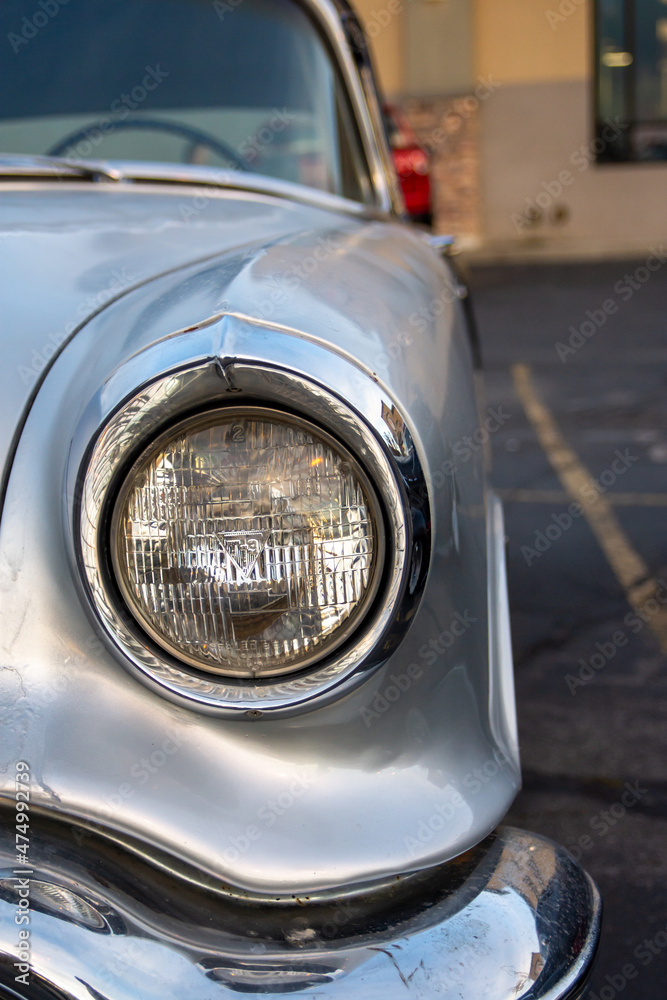 Detail shot of a classic chevy headlight. Vintage car. Classic car. American mucsle.