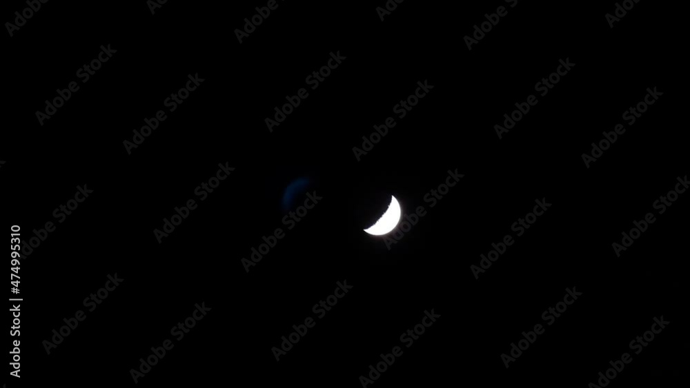 Half moon in the dark winter sky Half moon in the dark winter sky