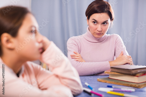 Mother seriously talks to daughter about bad progress at school