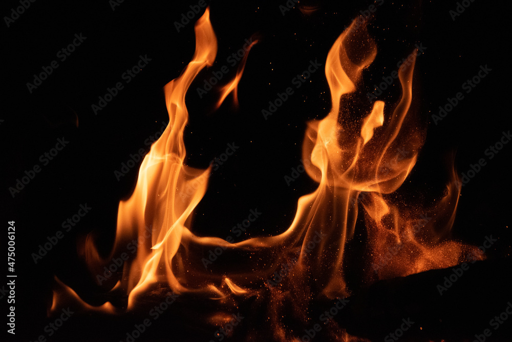 Fire flames on black background. lights on a black background. Fire flames on black background. lights on a black background.