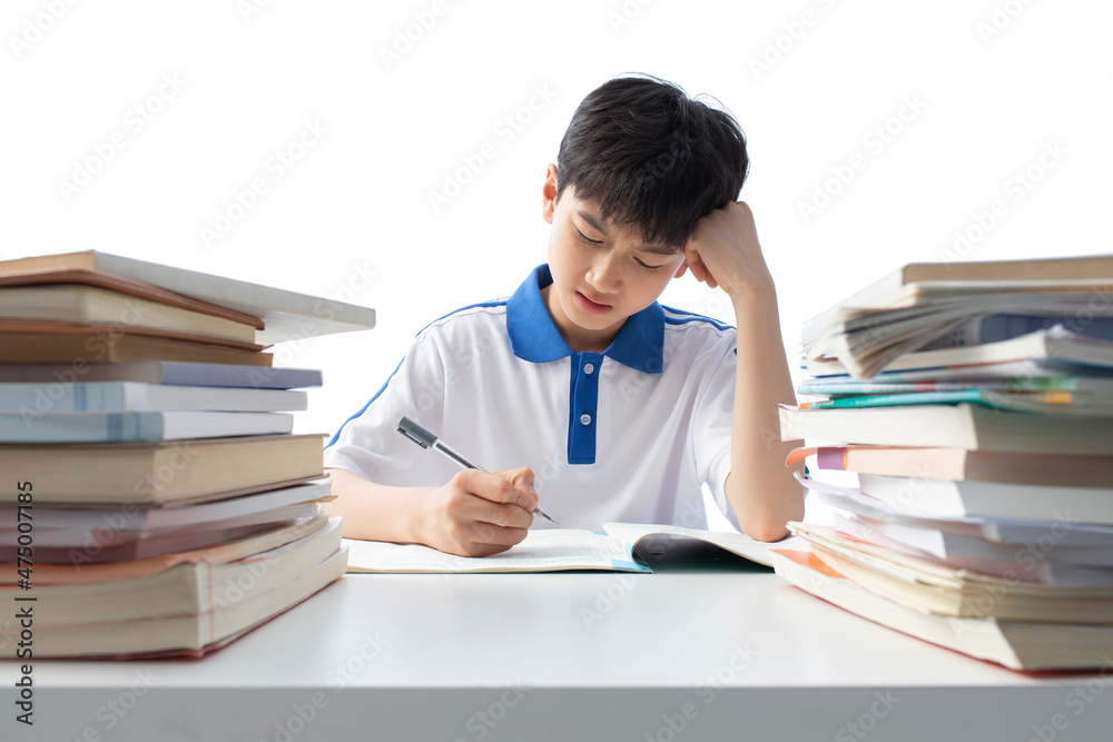 Teenage boy doing homework Teenage boy doing homework