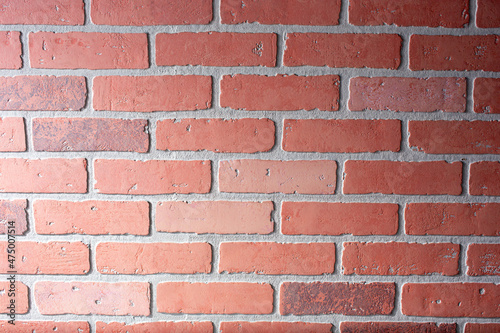 A view of a rustic masonry style brick wall, as a background.