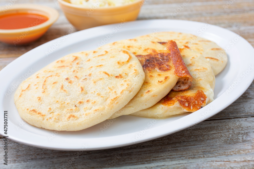 A view of a plate of pupusas.