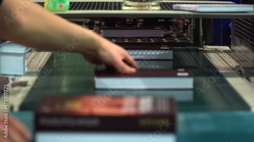 Production of books in hard and soft cover. Equipment for printing books. Typography press. Media Publishing House. Typography