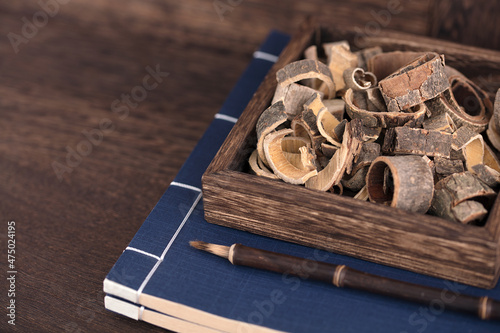 Wallpaper Mural Magnolia officinalis and albizia bark in a wooden box Torontodigital.ca