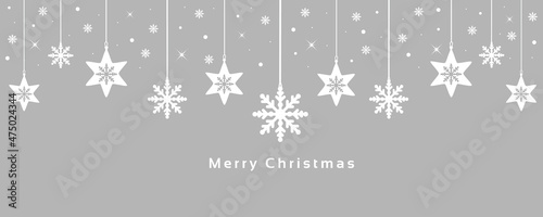 Merry Christmas greeting card. Xmas banner with snowflakes hanging.Vector design of winter holidays on grey background.