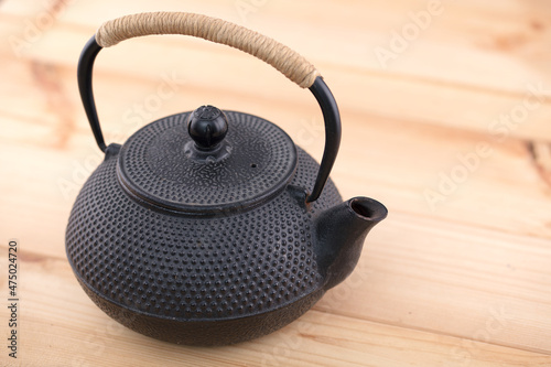 The black iron pot is close-up on the table