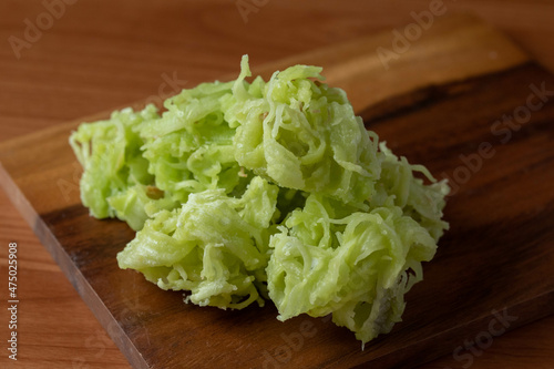 Coconut sweet (Thai Traditional Dessert) is green noodles with pandan flavor.