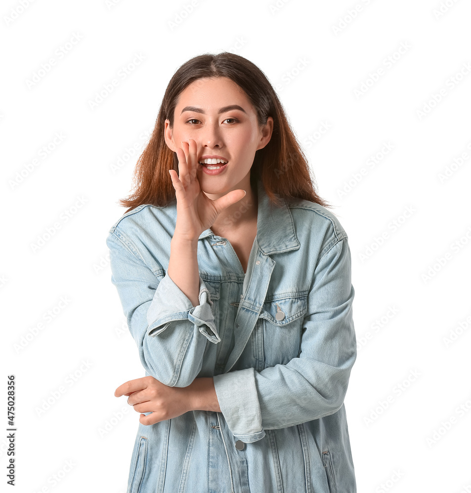 Young gossiping Asian woman on white background Young gossiping Asian woman on white background