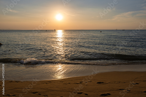 Najomtien beach Pattaya Thailand, sunset at a tropical beach with palm trees. Pattaya Thailand photo