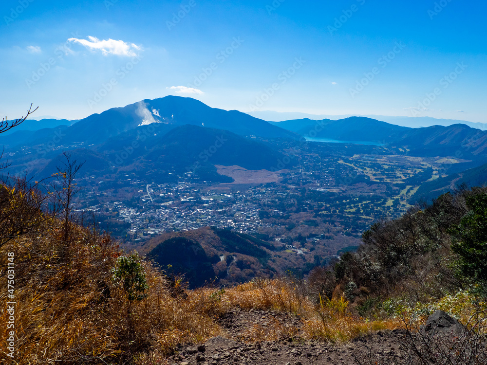 Viewing the town, volcano, and caldera lake from mountainside (Mt.Kintoki, Hakone, Kanagawa, Japan)