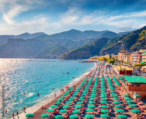 Wonderful summer view of Maiori public beach. Stunning morning seascape of Mediterranean sea, Amalfi coast in the province of Salerno, Italy, Europe. Vacation concept background.. photo