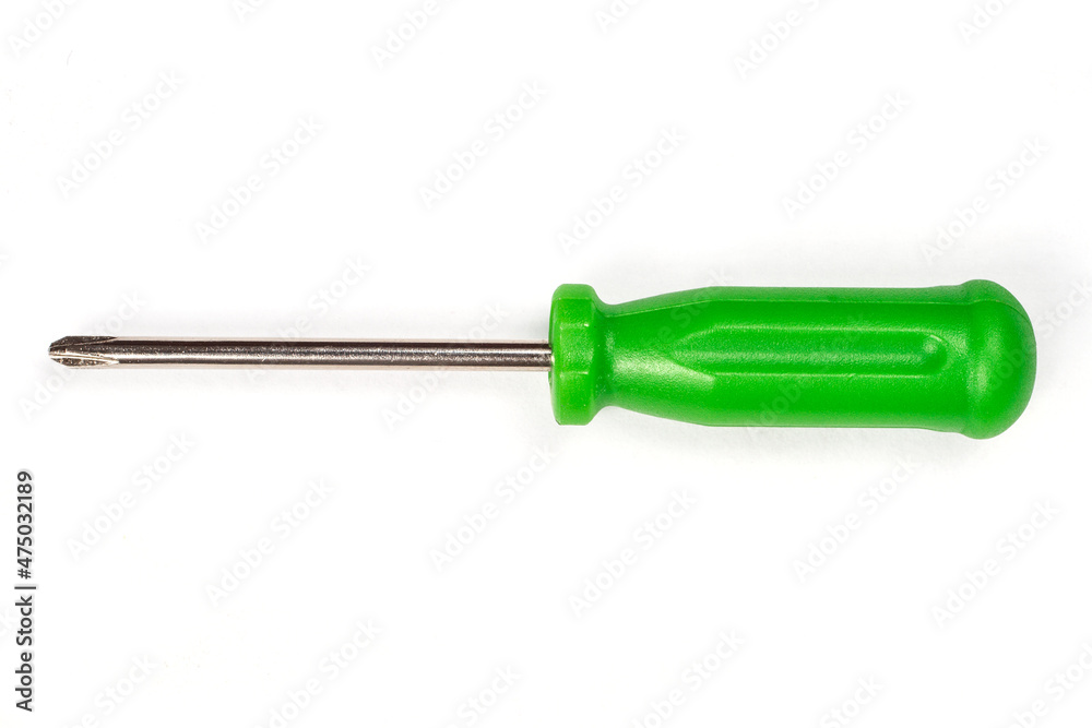 Screwdriver with green handle on a white background. Screwdriver with green handle on a white background.