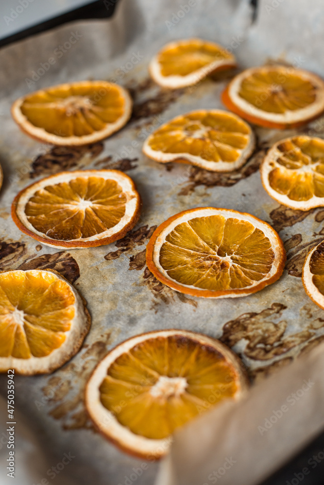 Dried orange oranges from the oven. Fragrant citrus slices for decoration. Dried orange oranges from the oven. Fragrant citrus slices for decoration.