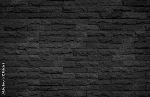 Abstract dark brick wall texture background pattern, Brickwork painted of black color interior old clean concrete grid uneven design backdrop decoration.