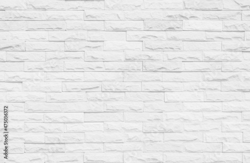 White grunge brick wall texture background for stone tile block painted in grey light color wallpaper 