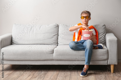 Little boy in eyeglasses wi...