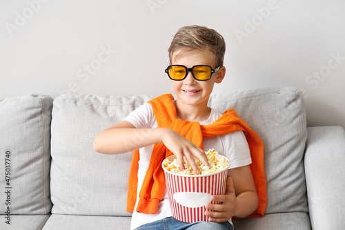 Little boy in eyeglasses wi...
