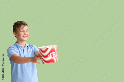 Little boy with bucket of t...