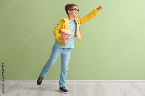 Little boy in eyeglasses wi...
