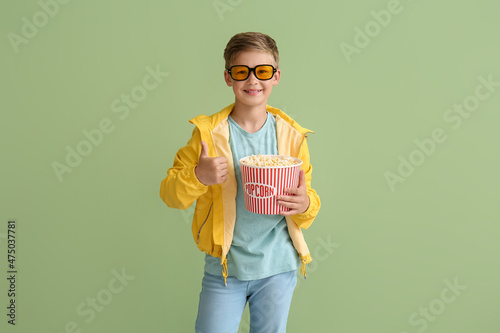Little boy in eyeglasses wi...