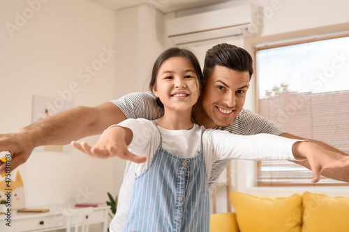 Happy man and his little da...