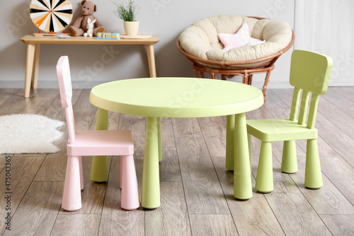 Interior of children s room with table and chairs