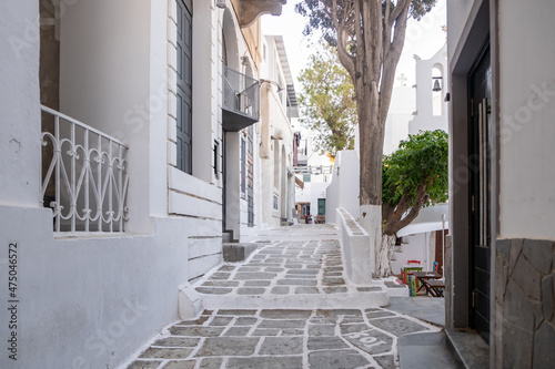 Cyclades, Greece. Ios, Nios island, Chora. Whitewashed buildings and narrow cobblestone alley. photo