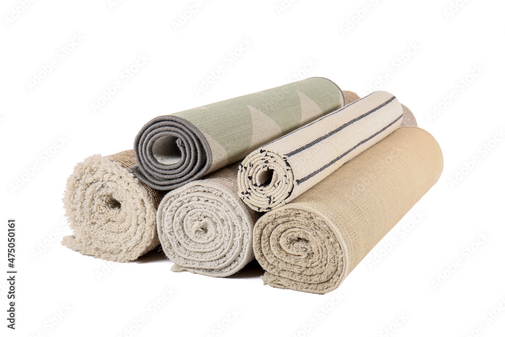 Different rolled carpets isolated on white Different rolled carpets isolated on white