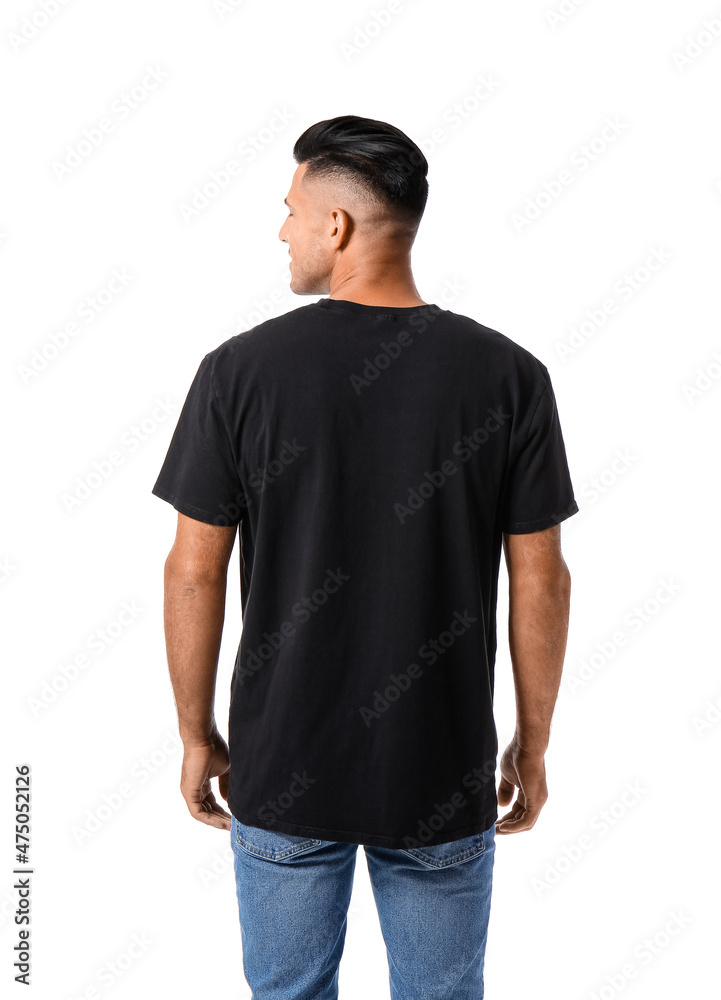 Fototapeta premium Handsome young man in stylish t-shirt isolated on white, back view