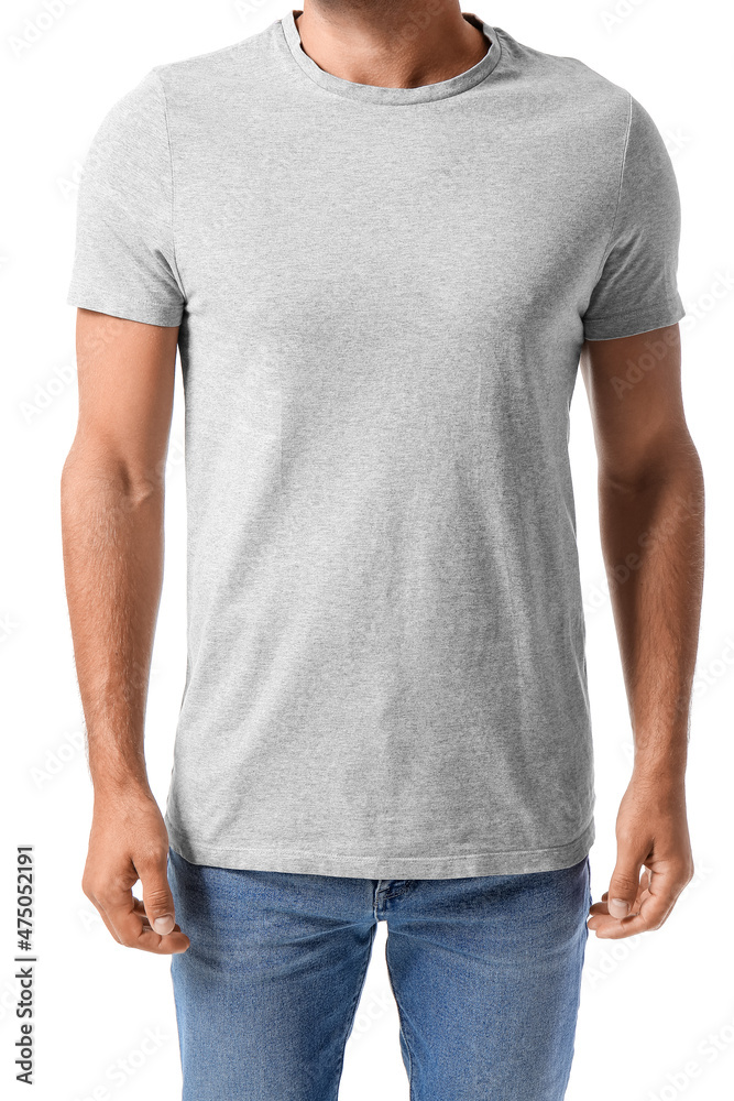 Obraz premium Handsome young man in stylish t-shirt isolated on white
