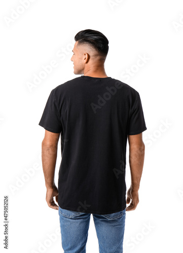 Handsome young man in stylish t-shirt isolated on white, back view