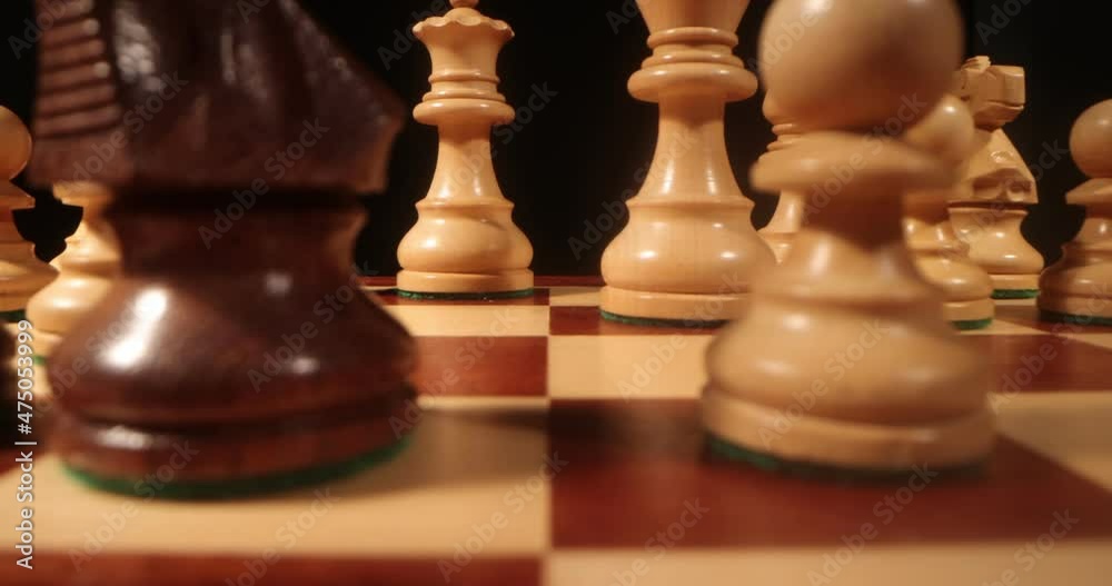 Chess board and pieces close up . Chess figures on chess board macro shot . Slider move, 4k Chess board and pieces close up . Chess figures on chess board macro shot . Slider move, 4k